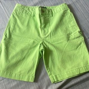 Green shorts.